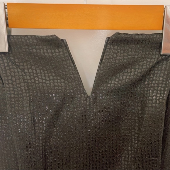 This is a one piece sexy jumper. Black snake skin very comfortable very soft. - Picture 3 of 4